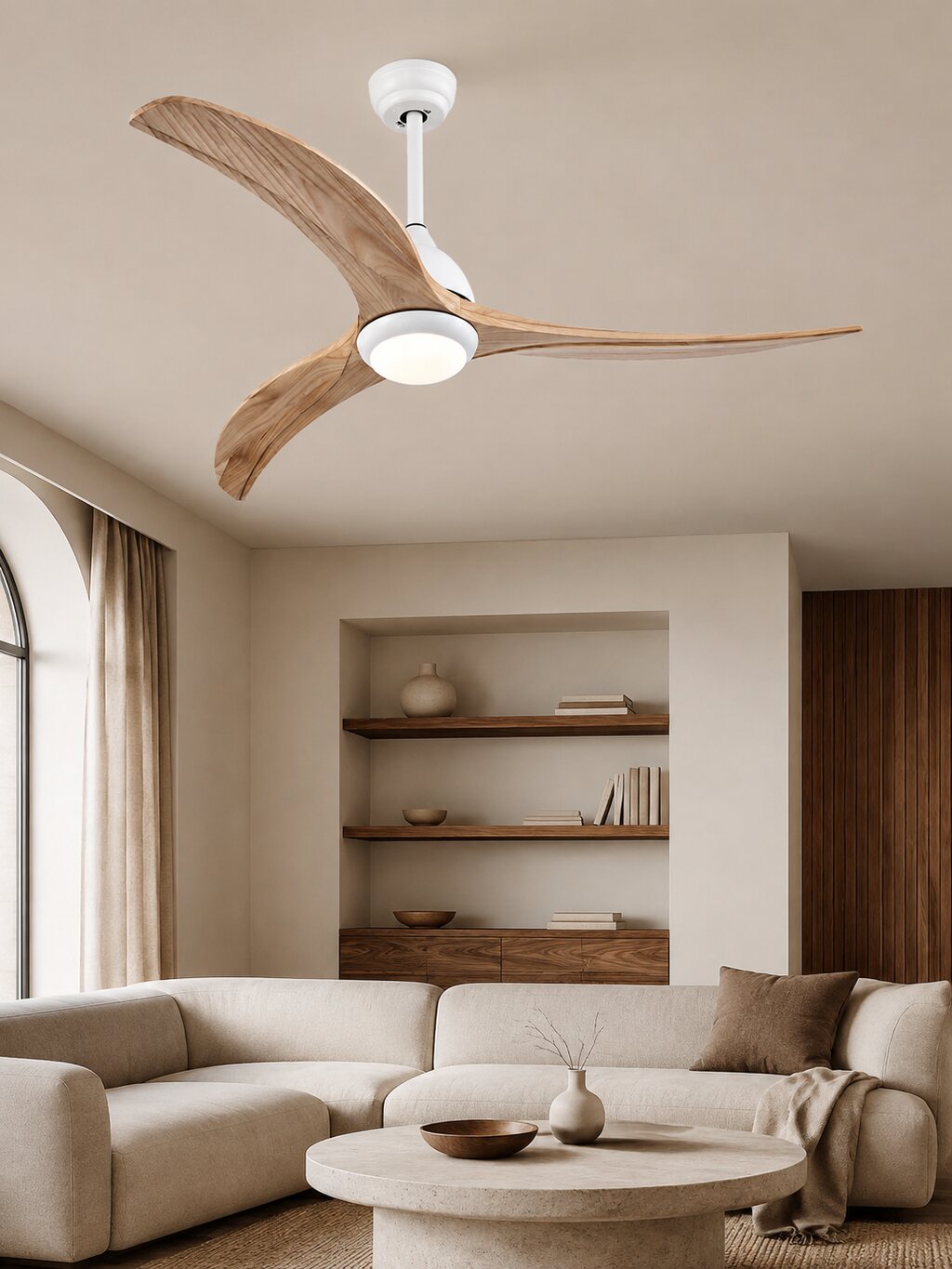 A quiet wood ceiling fan in a light-filled living room.