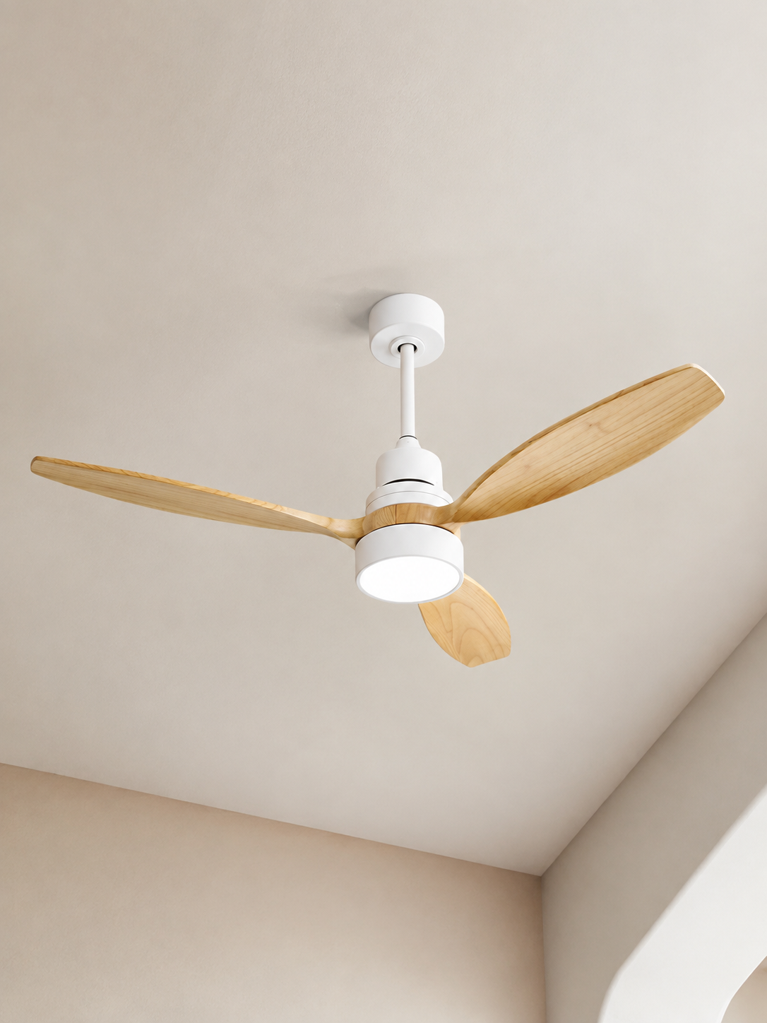 52-inch Wooden Color ceiling fan centered on a pale limewash ceiling