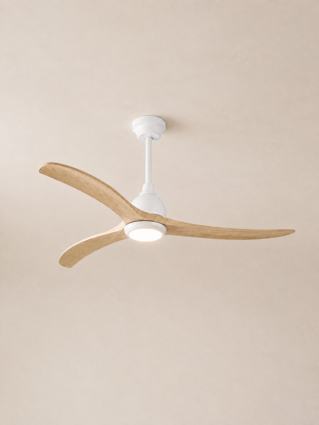 52-inch Wooden Color three-blade ceiling fan with integrated LED centered on a pale limewash ceiling