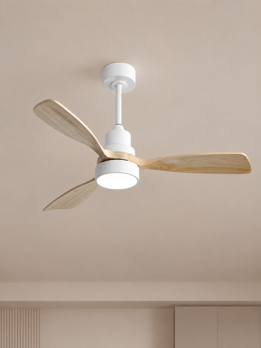 48-inch White + Natural Wood ceiling fan centered on a pale limewash ceiling